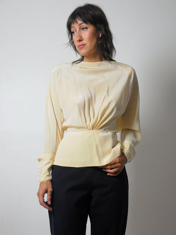 Buttercream Silk Peplum Blouse